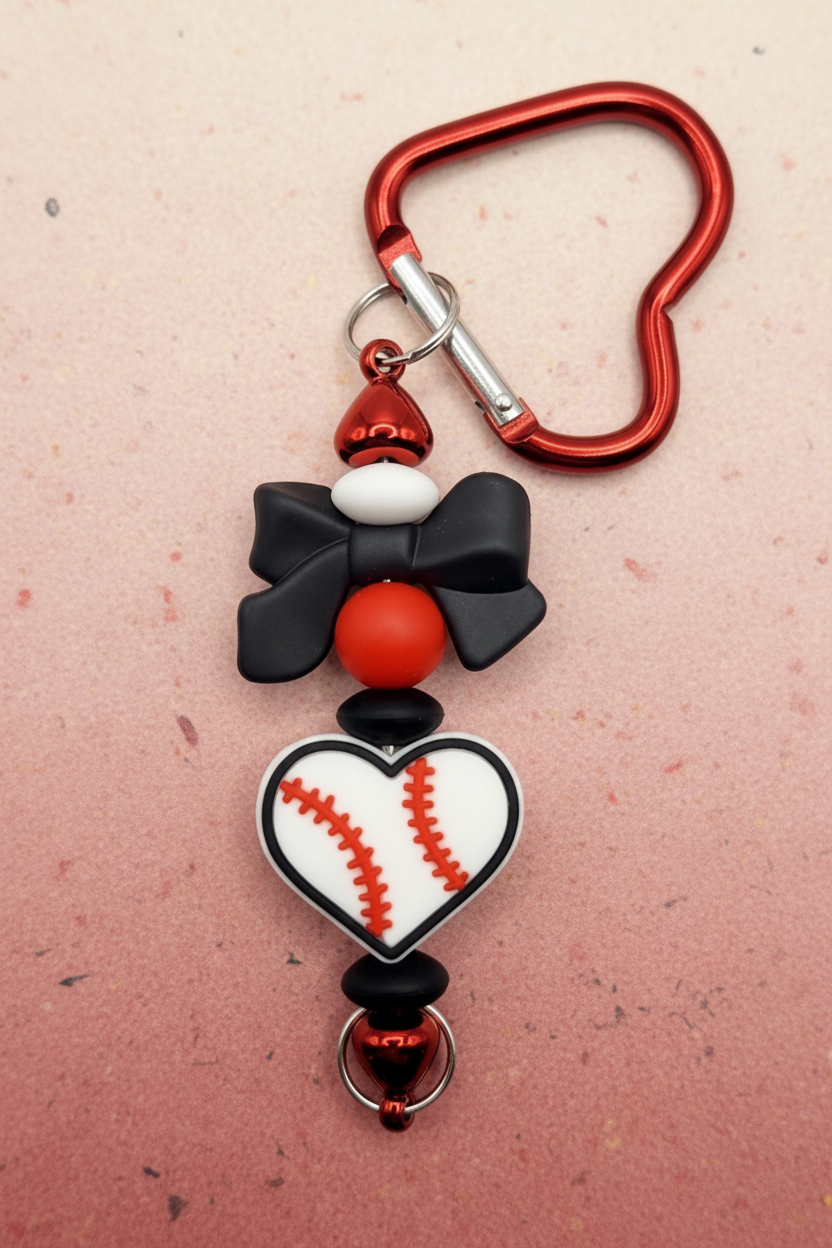 Game Day Style: Heart Baseball Keychain with Black Silicone Bow and Metallic Red Heart Clip